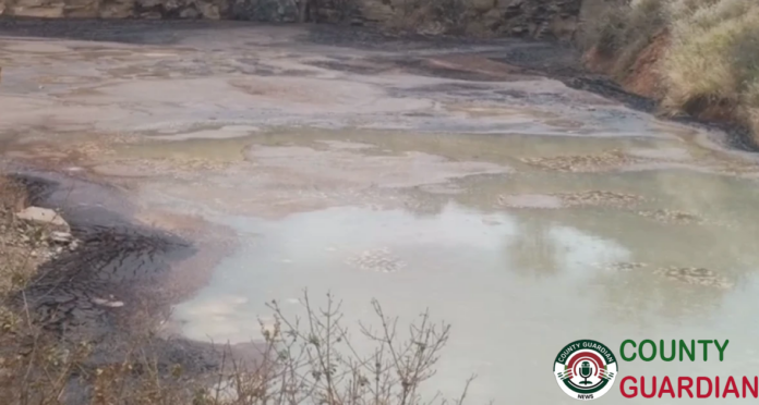 Green water in Matheng'eta River in Tumutumu, Machakos County