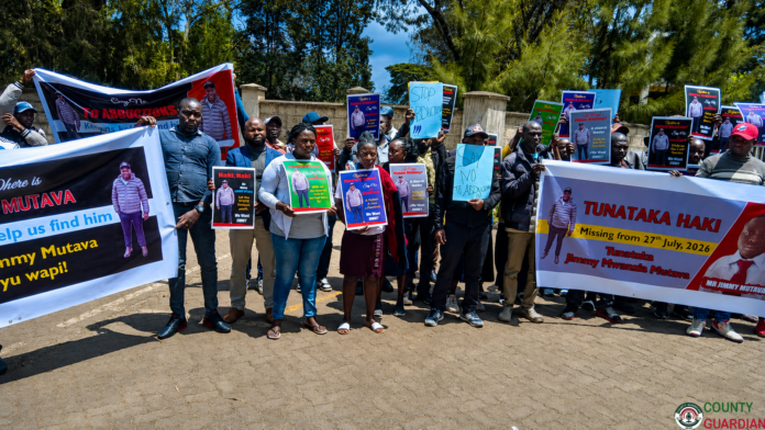 Family and friends of missing Mlolongo businessman Jimmy Mutava outside Machakos High Court