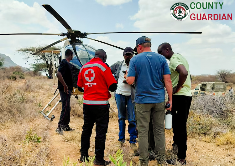 Rescue officials at the site of the Samburu helicopter crash